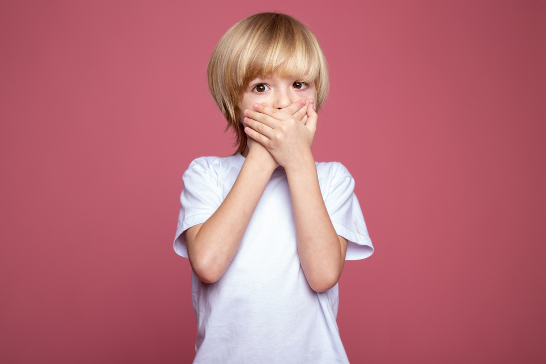 Shocked Boy Covering His Mouth